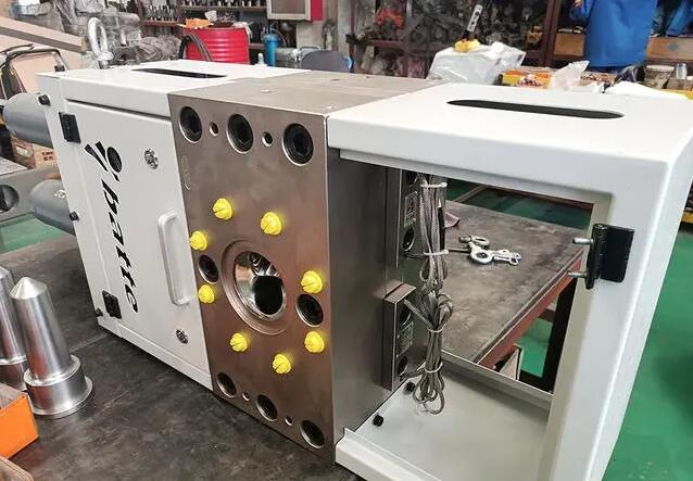 dual channel plate non-stop screen changer