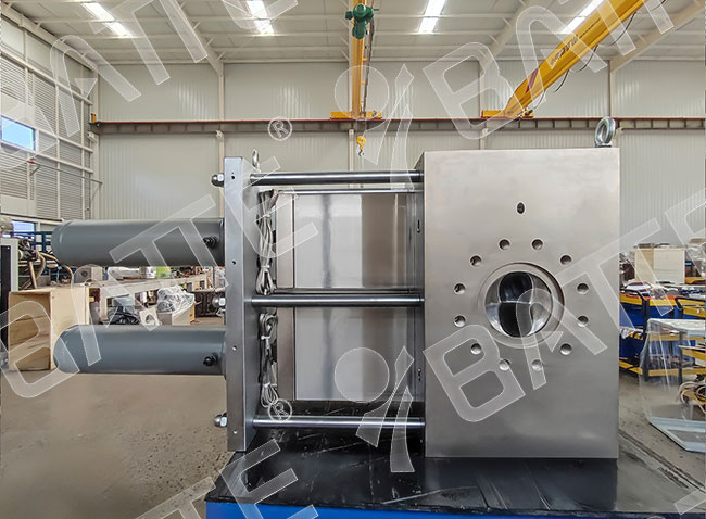 double plate hydraulic screen changer