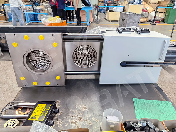 Single slide plate screen changer