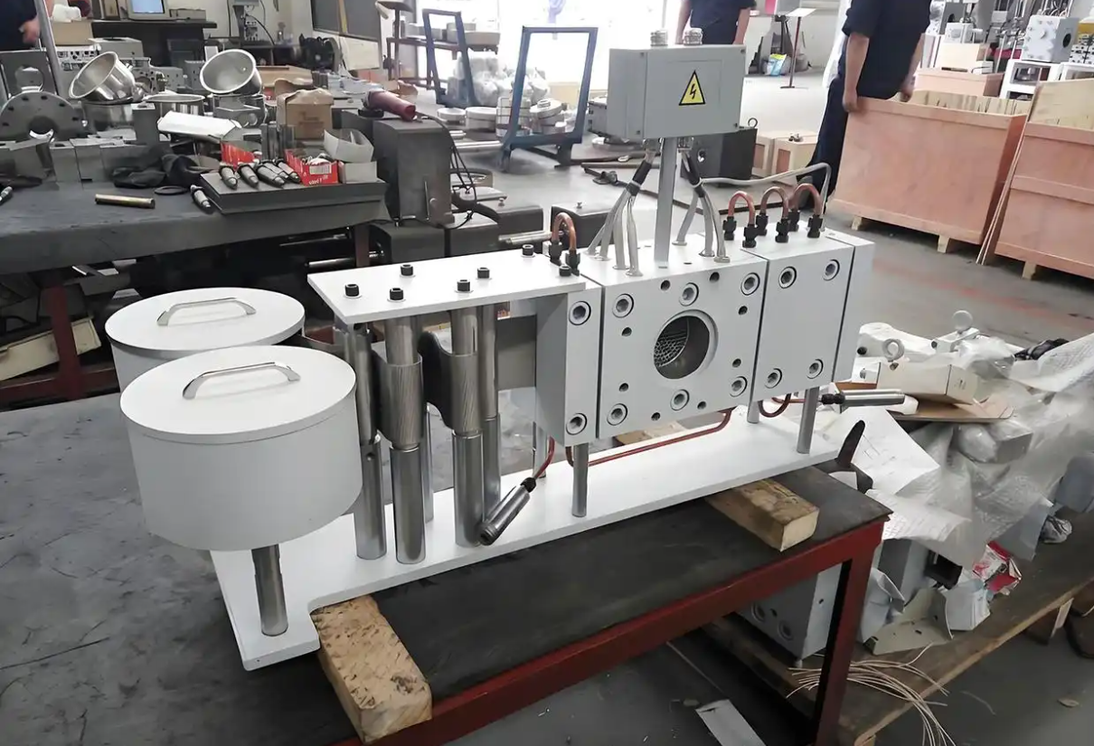 mesh belt screen changer