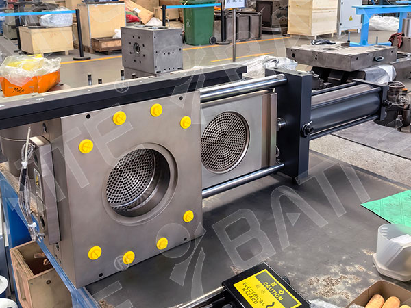 Polymer screen changer